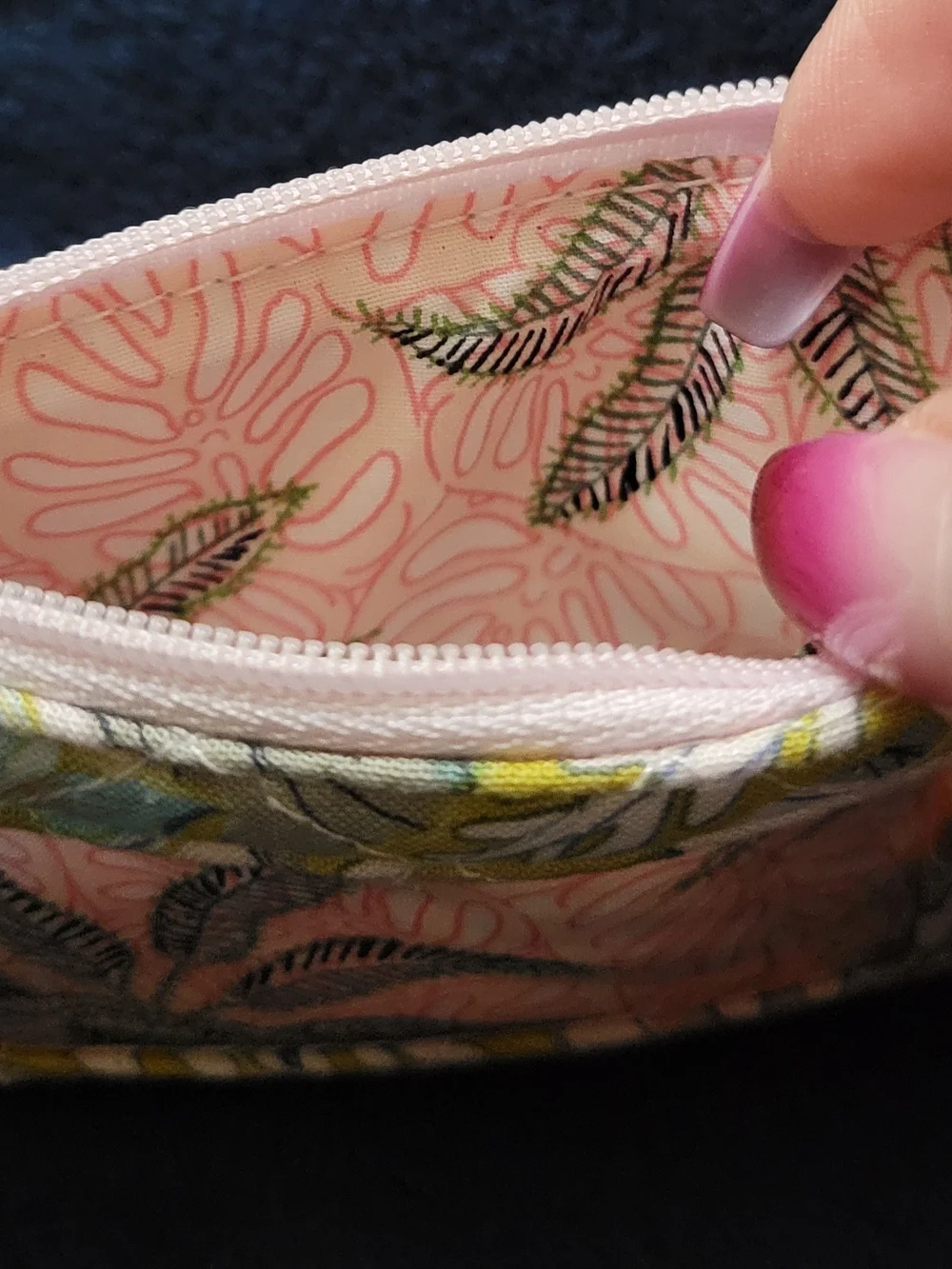 Vera Bradley Zip ID case features a 